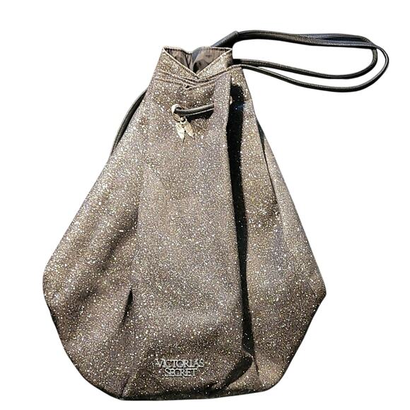Victoria’s Secret Gray Silver Glitter Sling Backpack NWOT Drawstring Angel Charm - Picture 1 of 9